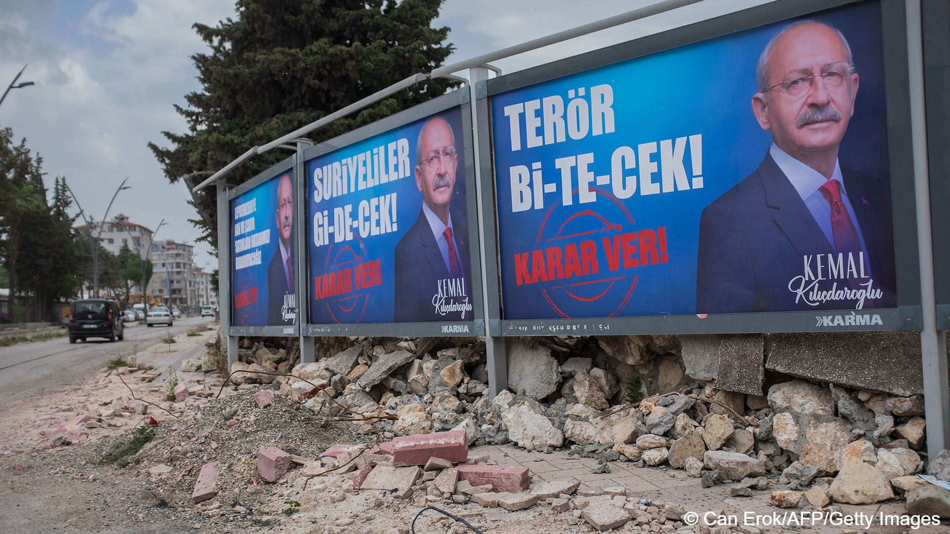 Three billboards displaying election posters for Turkey's opposition presidential candidate Kemal Kilidaroglu