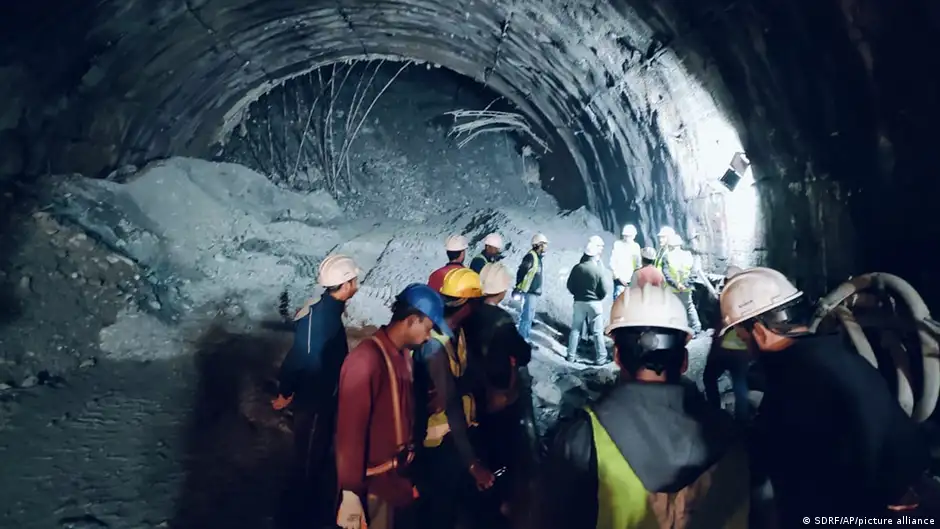 Rescue workers inside a collapsed tunnel in India