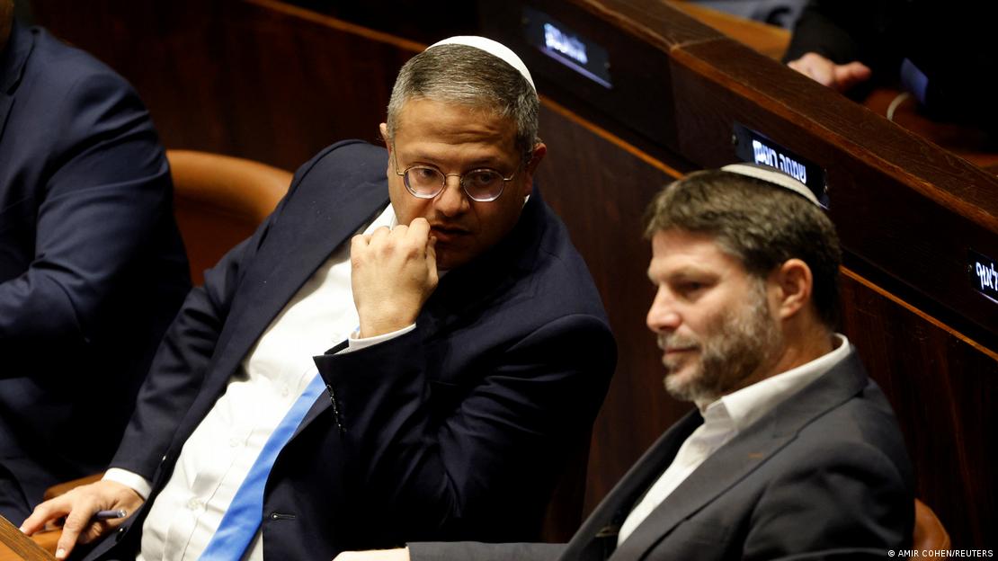 Israel's National Security Minister Itamar Ben-Gvir (left) and Finance Minister Bezalel Smotrich sit together in the Knesset