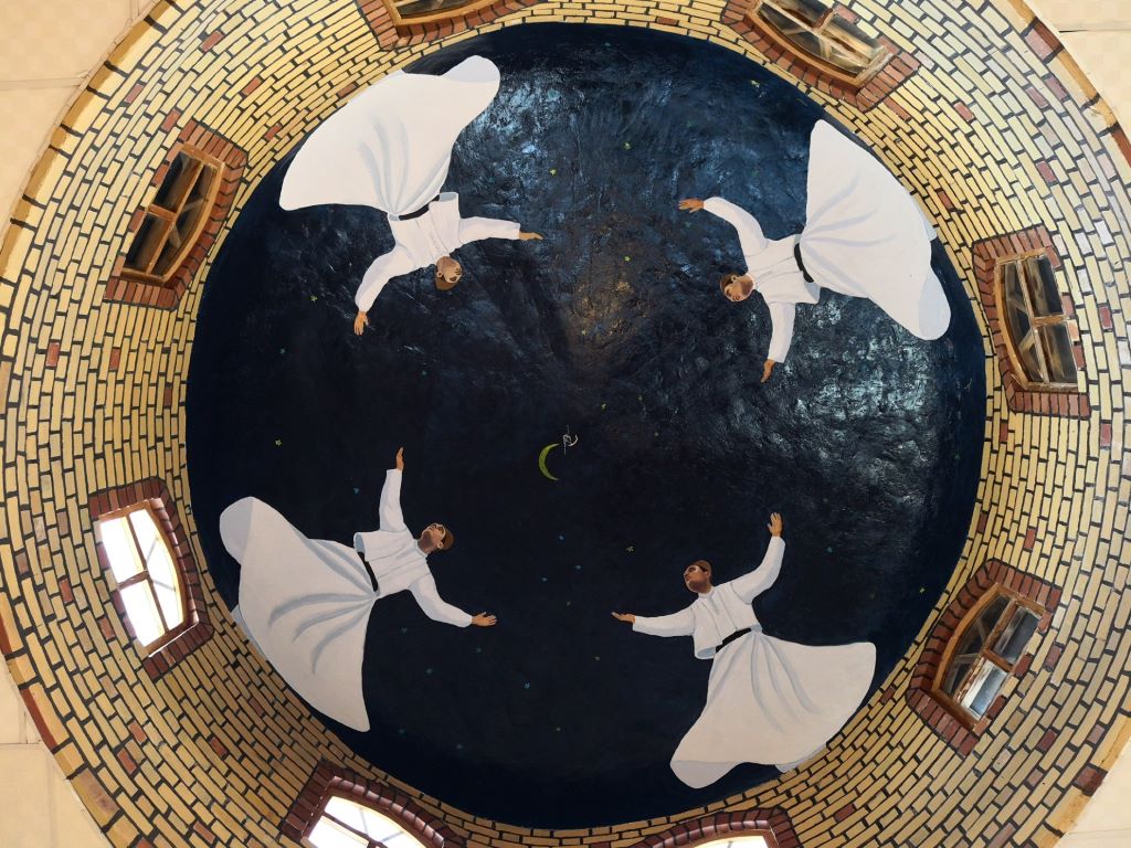 Dervishes on a ceiling painting in a cultural centre in Mazar-i-Sharif, Afghanistan