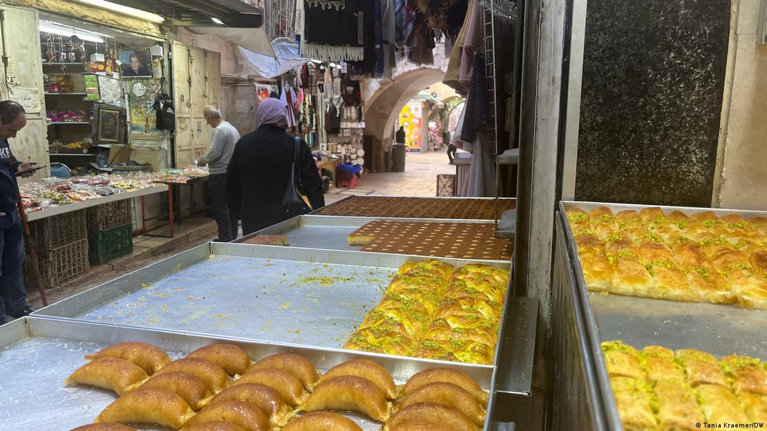 Trays of baklava and other sweet treats are displayed in a market in East Jerusalem