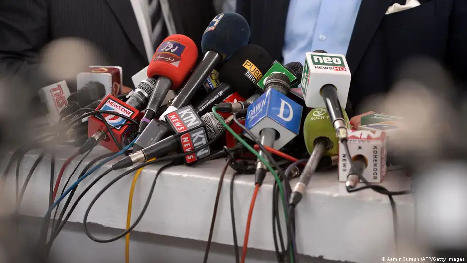 A bunch of media microphones during a press conference in Islamabad