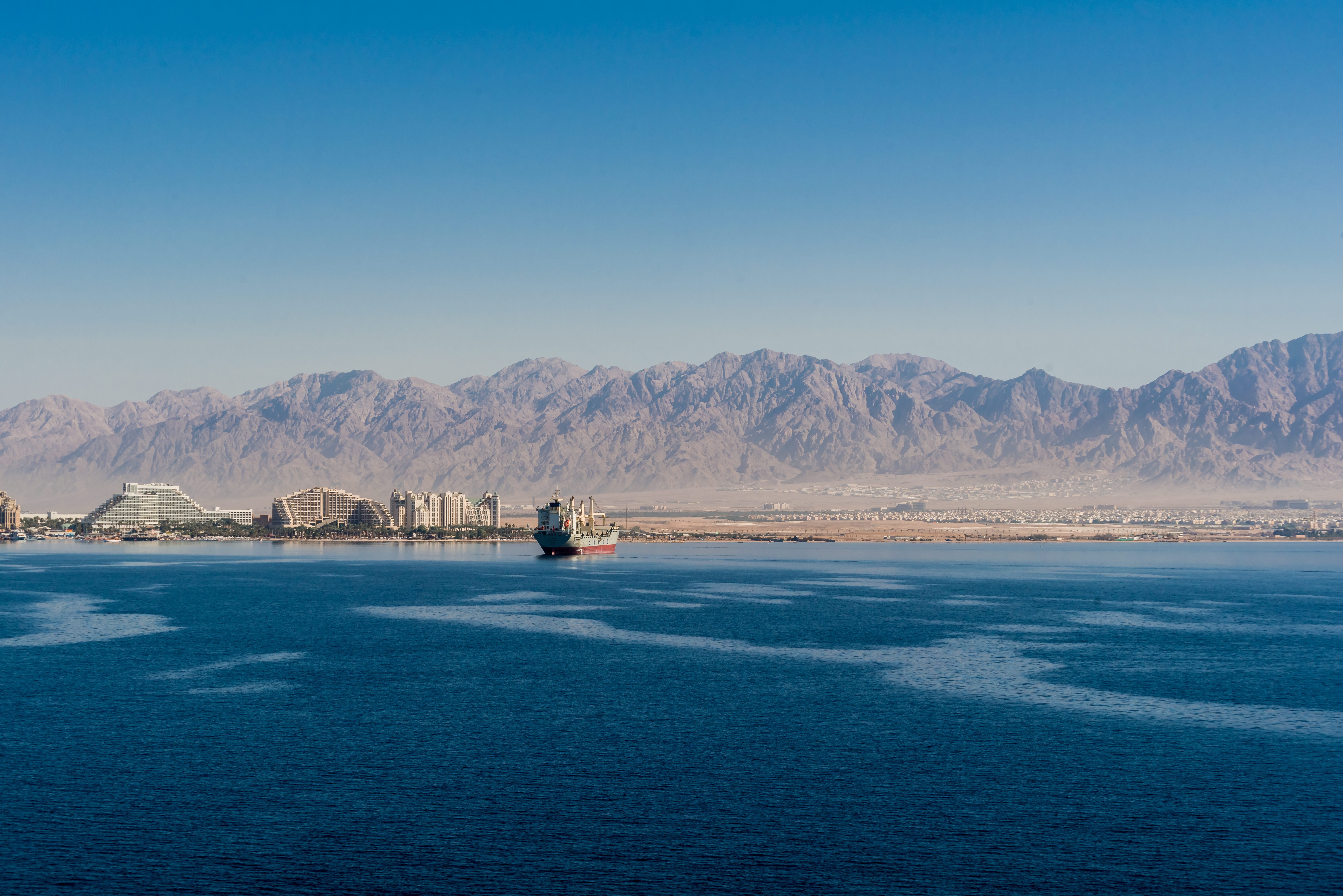 View of the Gulf of Aqaba from the sea. To the left is Eirat in Israel and to the right is Aqaba in Jordan.