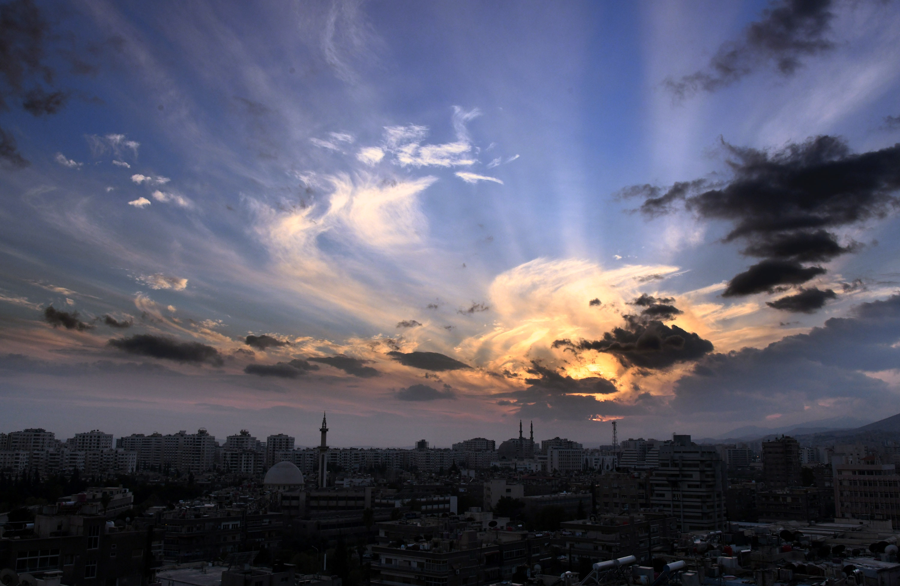 A sunset over the Damascus skyline. 