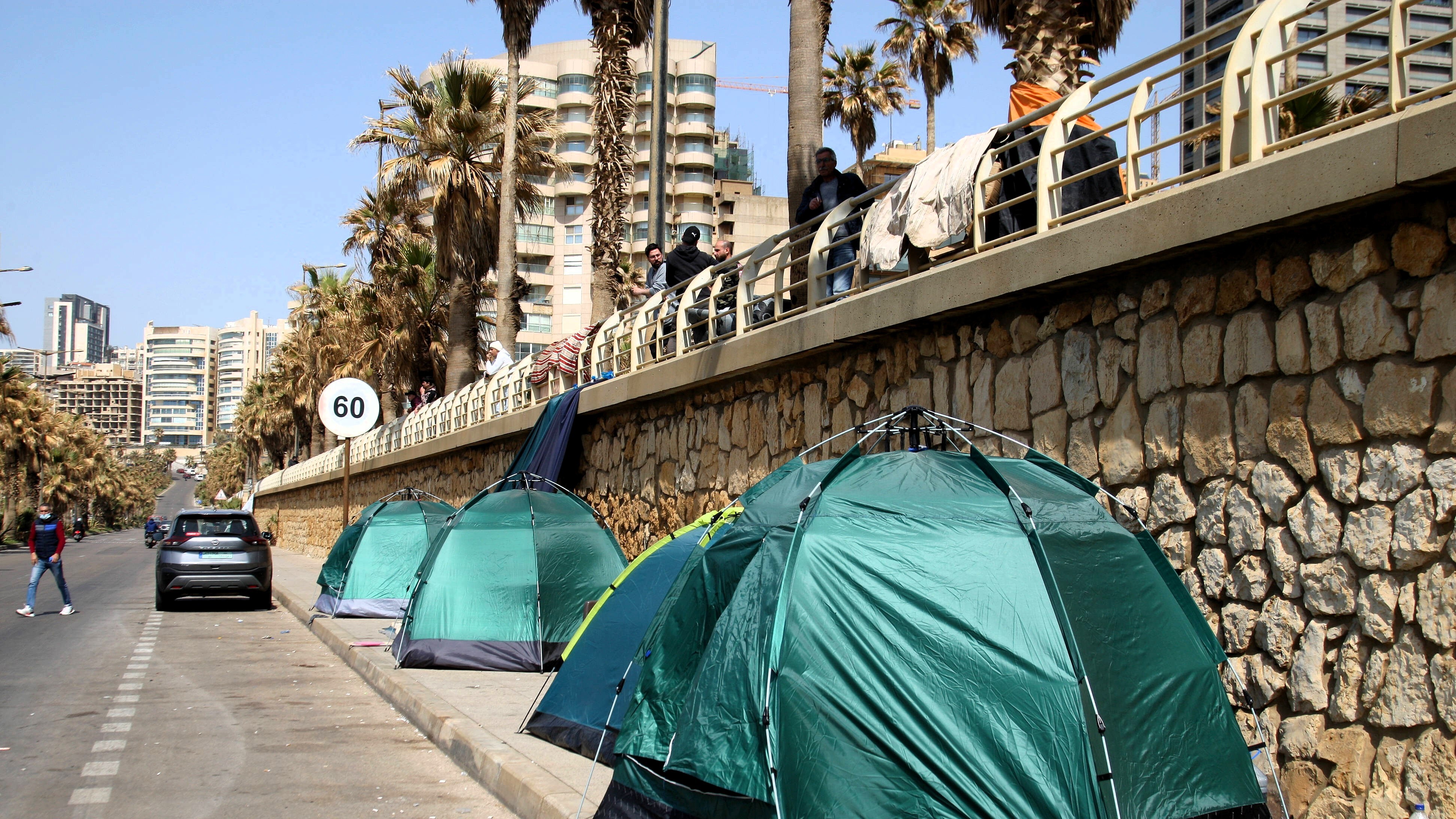 Displaced people live in tents along the seaside of Ramlet al-Baida on the Beirut Corniche in Beirut, Lebanon, on March 12, 2026, near the site where an Israeli strike reportedly targeted people sheltering in tents.