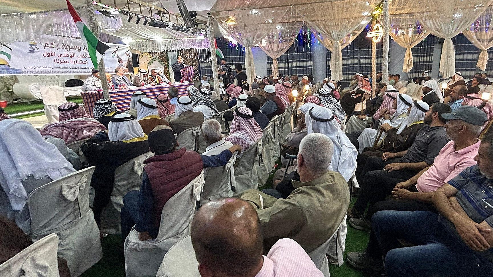 A gathering of people are listening to a speech. (Photo: Mohamed Solaimane)