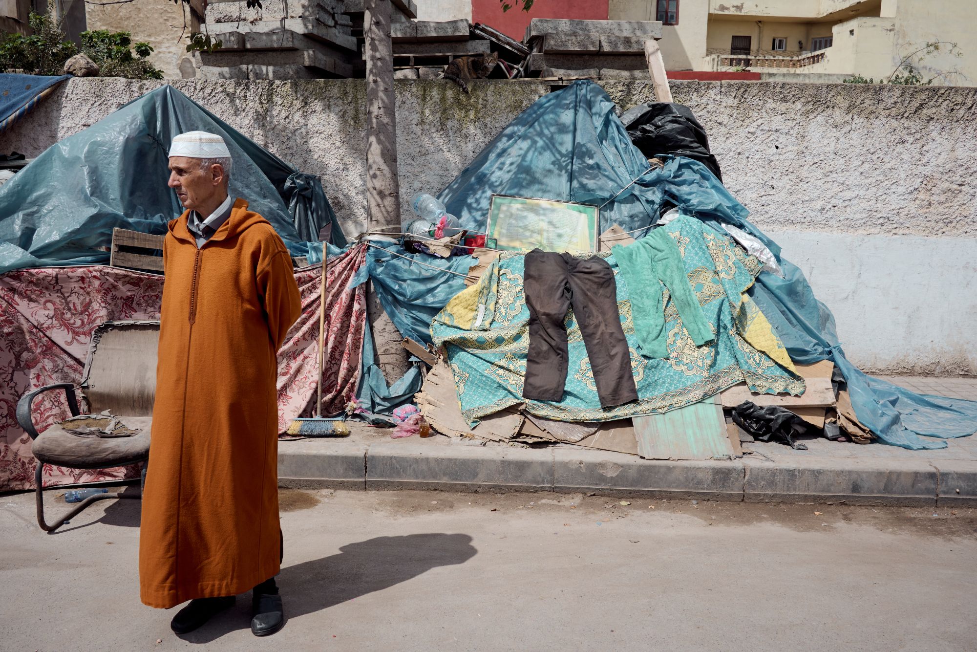 A resident stands beside the remains of his belongings after his home was demolished in Casablanca’s Old Medina during clearance operations linked to the future Royal Avenue redevelopment project. Casablanca, Morocco, 15 May 2026. (Photo: Yassine Toumi)