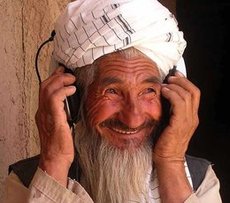 Afghan farmer with headphones (photo: Afghan Eyes)