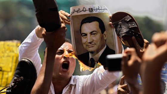  Demonstrant auf dem Tahrir-Platz in Kairo; Foto: dapd