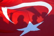 Shadows on the Turkish flag (photo: AP)