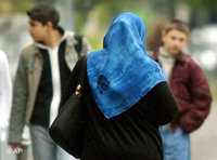 Woman wearing a headscarf (photo: AP)