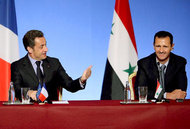 France's President Sarkozy and his Syrian counterpart Al Assad (photo: picture alliance/ dpa)