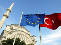 Turkish and EU flags, with an Istanbul mosque in the background (photo: AP)