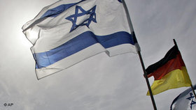 Israeli and German national flags at the Tel Aviv airport during Angela Merkel's visit in Israel (photo: AP)