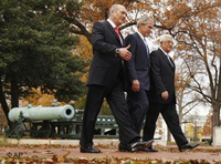 From left to right, Ehud Olmert, George Bush Jr., Mahmoud Abbas