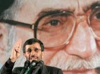 Mahmoud Ahmadinejad speaks in front of a larger-than-life size image of Iran's Ayatollah Ali Khamenei, during the 17th anniversary of the death of Ayatollah Khomeini in Tehran (photo: AP)
