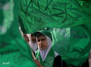 Hamas supporter waving a Hamas flag (photo: AP)