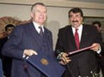 German Interior Minister Otto Schily and his Turkish counterpart Abdulkadir Aksu after signing an agreement to jointly combat terrorism and organised crime in Ankara in March 2003.