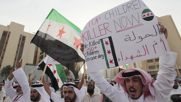 Demonstration in front of the seat of the UN in Manama (photo: Reuters)