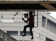 Worker in Jakarta (photo: AP)