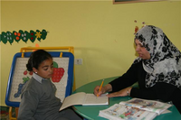 Child care at the Palestinian Happy Child Center (photo: Muhanad Hamed)