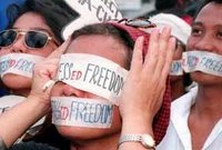 Menschenrechtsaktivisten mit Augenbinden, Foto: dpa