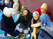 Turkish women and children in an Islamic school in Berlin, Germany (photo: AP)
