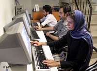 Three Iranians at internet workstations (photo: dpa)
