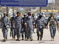 شرطيون عراقيون في معسكر تدريب، الصورة: ا.ب