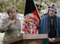المستشارة الألمانية ميركيل والرئيس الأفغاني كارزاي