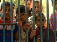 Children in Iraq behind bars (photo: AP)