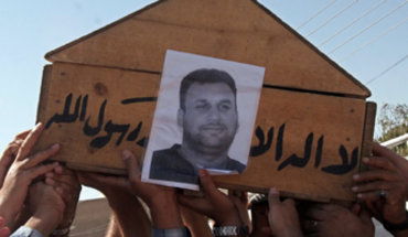 جنازة الصحفي العراقي وليد خالد، الصورة: أ.ب