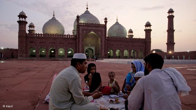 During Ramadan, the ninth month of the Islamic lunar calendar, the breaking of the fast, or ''Iftar'', begins at sunset. A Pakistani family celebrate ''Iftar'' on the square of the 17th century Mughal Badshahi Mosque in Lahore