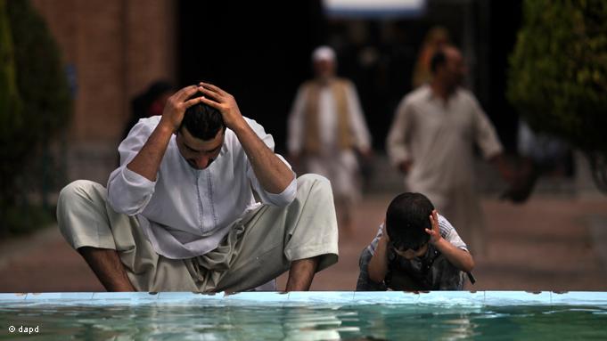 A father and son in Indian Kashmir conduct the cleansing ritual to prepare themselves for the obligatory prayers. Ramadan is also a time devoted to intensive prayer and spiritual reflection