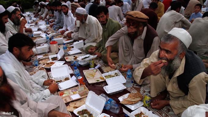 Iftar dinner for jobless men in Afghanistan. Alongside the declaration of faith, daily prayer, the pilgrimage to Mecca and the giving of alms, fasting is, as one of the five pillars of Islam, an integral element of the faith