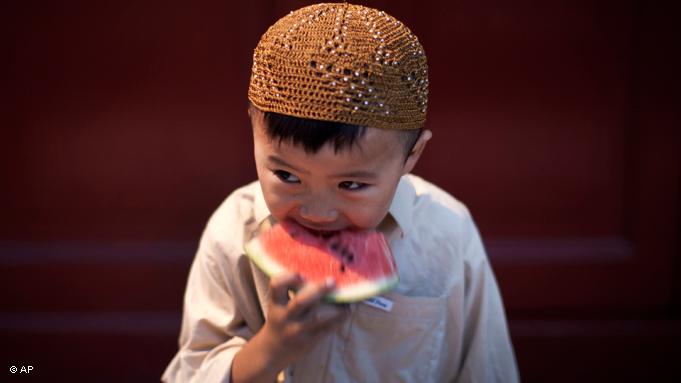 Children, such as this boy, who is a member of the Chinese Hui minority, are exempt from fasting. Pregnant women and the sick are also not required to fast