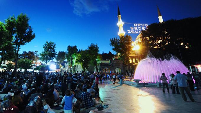 Close to the historic Eyüp Sultan Mosque in Istanbul, people enjoy the short night before the next day of fasting begins