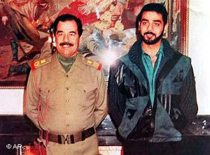 Saddam Hussein and his son Odari in 1990 (photo: AP)