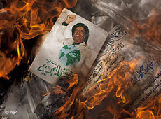 Gadaffi's Green Book, burning (photo: AP)