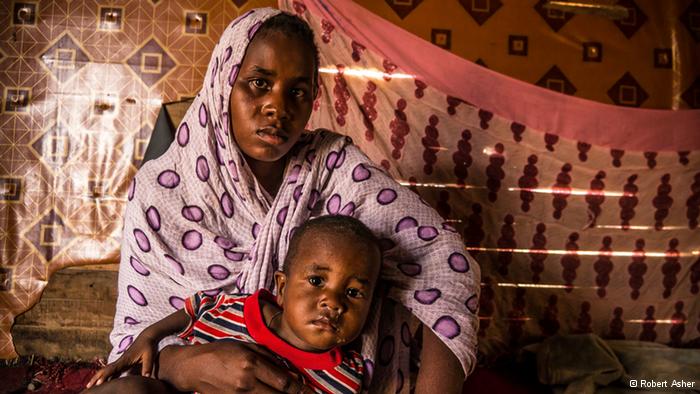 A freed slave woman in Mauritania and her child (photo: Robert Asher)