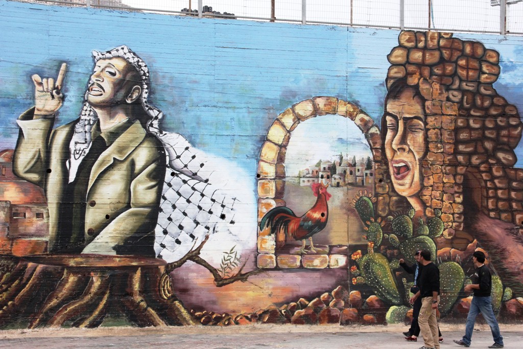 جدارية "هنا أرض كنعان" في الأراضي الفلسطينية، الصورة مهمد حامد 
