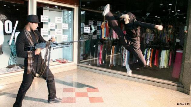 Stunt woman Mahsa Ahmadi leaps into the air in a fight scene (photo: Stunt 13)