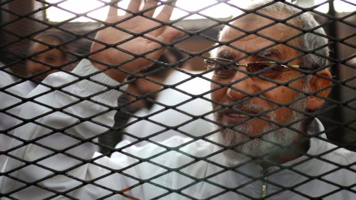 Mohammed Badie, the Muslim Brotherhood's supreme guide, behind bars (photo: Ahmed Gamil/AFP/Getty Images)