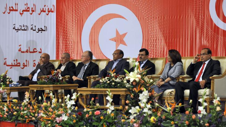 Tunisian President Moncef Marzouki (centre) during a National Dialogue meeting in Tunis on 16 May 2013 (photo: FETHI BELAID/AFP/Getty Images)