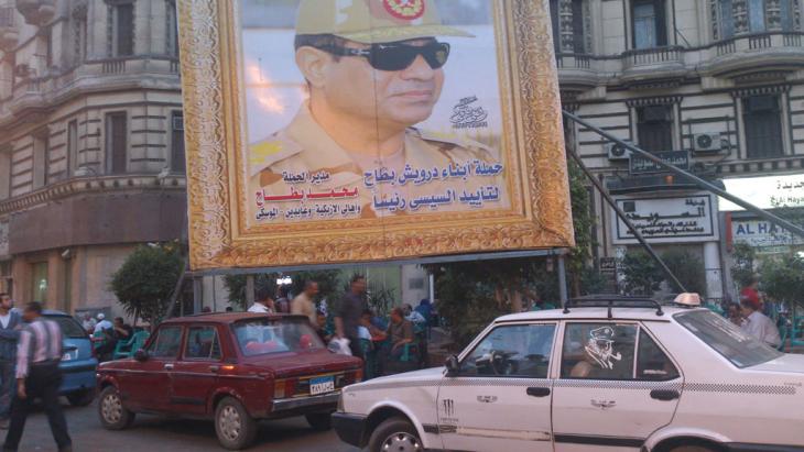 Poster of Abdul Fattah al-Sisi in a golden frame in Cairo (photo: Ahmed Wael)