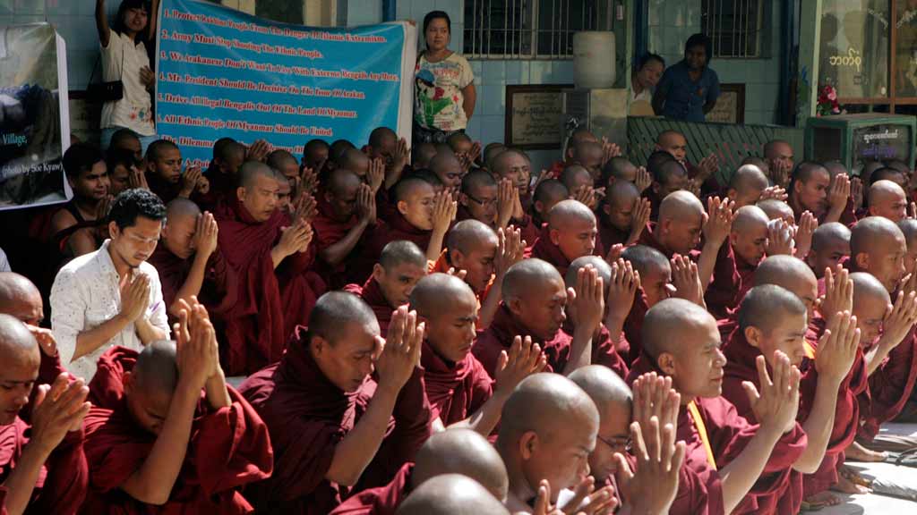 Myanmar Buddhist monks offer prayers during a rally against recent violence in Rakhine state, Yangon, Myanmar, October 2012 (photo: AP)