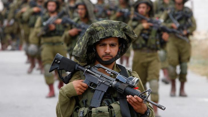 Israeli soldiers in the West Bank (photo: Reuters/Mussa Qawasma)