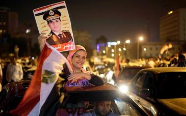 A supporter of Abdul Fattah al-Sisi on Tahrir Square in Cairo (photo: AMR NABIL/AP)