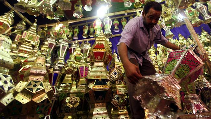 Stallholder with his wares in Cairo. Photo: Reuters