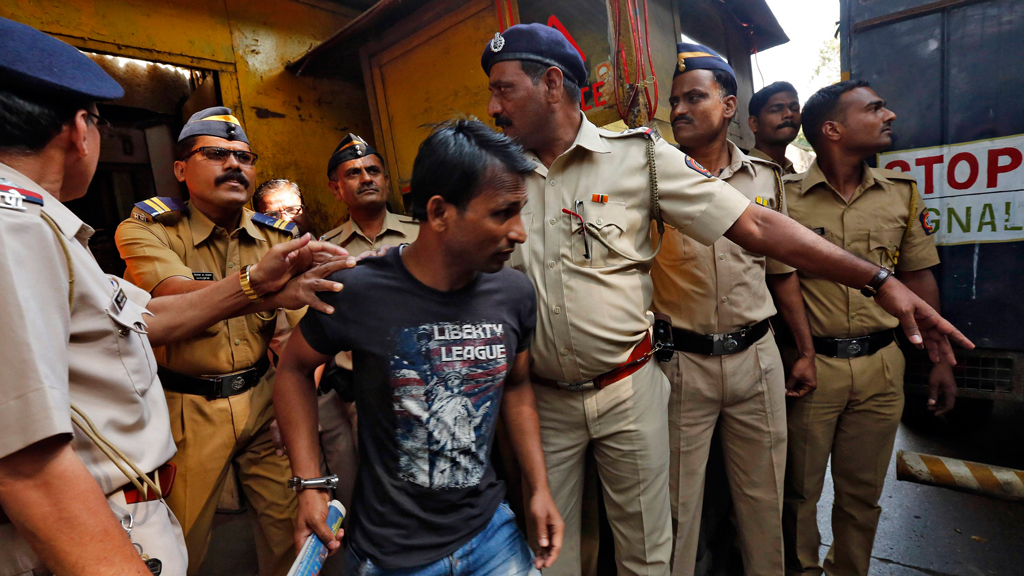 March 2014: Police escort one of four men convicted of the gang-rape of a photojournalist in Mumbai in 2013. Photo: REUTERS/Mansi Thapliyal